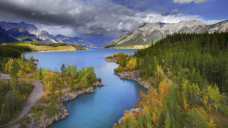 River trees mountains cloudy sky 3 - tree and mountains under a cloudy sky free wallpaper