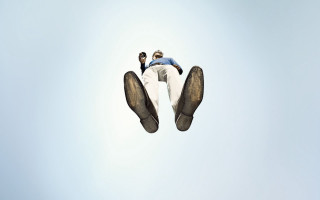 Flying man shoes sunny sky - a photo free wallpaper