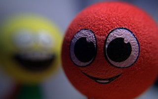 Red ball eye tiltshift moon - a black dot free wallpaper