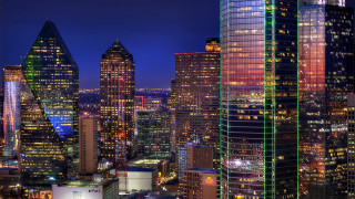City skyline night lit buildings - tall building free wallpaper
