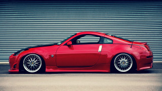 Red sports car garage roller 2 - clean free wallpaper