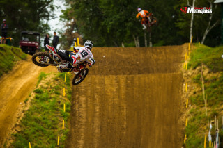 Dirt bike jump hill track 2 - a truck in the background free wallpaper