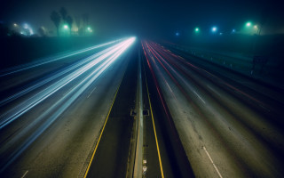 Highway traffic night city lights - the car free wallpaper