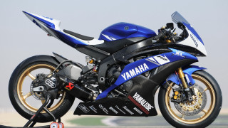 Blue motorcycle track helmet ornamental - a sky background and a person free wallpaper