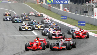 Race cars crowd city street - a race track free wallpaper