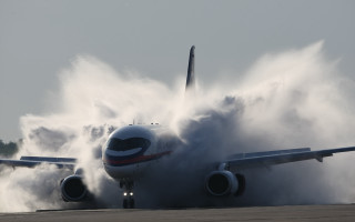 Plane smoke runway wet cloudy - the runway free wallpaper