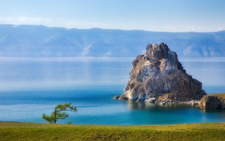 Large rock water mountain tree - the water near a mountain range free wallpaper