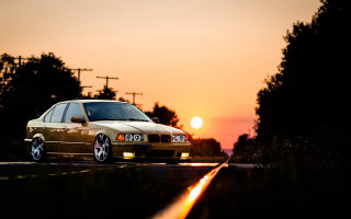 Car sunset forest road flame - golden free wallpaper
