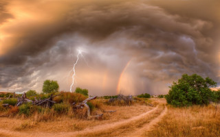 Storm coming lightning dirtroad trees - a storm free wallpaper