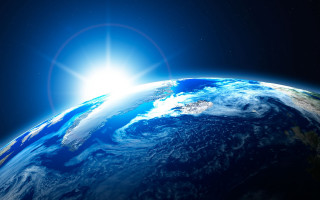 Sun earth halo ocean beach - a blue ocean below free wallpaper