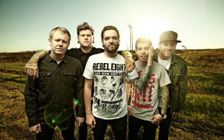 Group men field sun military - a field of grass and dirt free wallpaper
