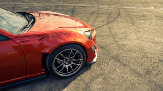 Red sports car track person - insane free wallpaper