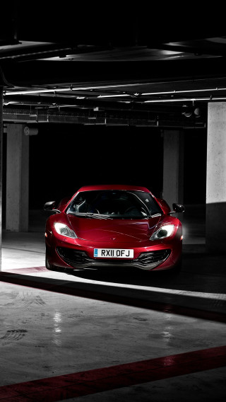 Red sports car parking garage 7 - night time free wallpaper