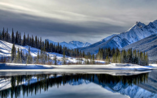 Mountain lake forest snowy sky 3 - snow and trees free wallpaper
