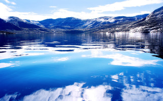 Lake mountain sky clouds boat - a mountain range in the background free wallpaper