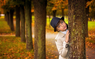 Girl leaning against tree autumn - the ground and trees free wallpaper