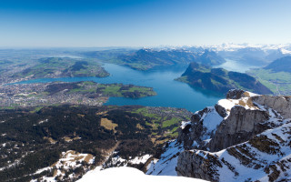 Mountain lake snowy horizon nature 3 - a view of a mountain range free wallpaper
