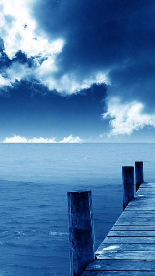 Pier boat cloudy sky ocean - the water below free wallpaper