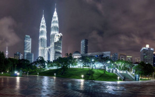 Cityscape skyline night bridge tower - a cloudy sky in the background free wallpaper