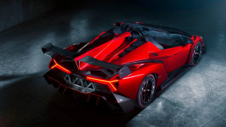 Red sports car black interior 2 - a spotlight free wallpaper