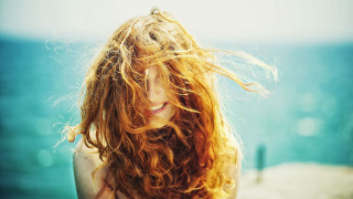 Woman red hair beach ocean - the wind free wallpaper
