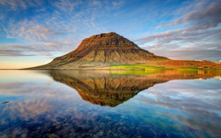Mountain lake clouds island sky - a small island in the middle free wallpaper