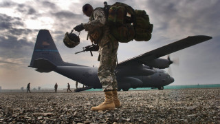 Soldier military plane rocky ground - a soldier free wallpaper
