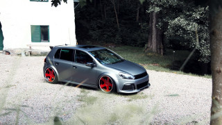 Car parked gravel lot house - a car free wallpaper