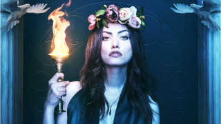 Woman candle flower crown bird - her head and a bird free wallpaper