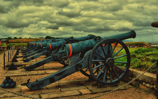Old cannon display cloudy sky - old free wallpaper
