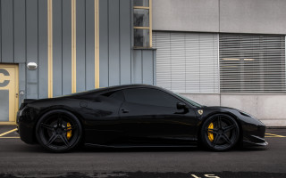 Black sports car yellow stripe - a yellow stripe free wallpaper
