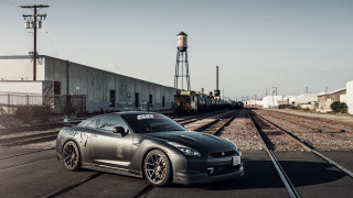 Silver car traintrack water tower - a silver car free wallpaper