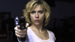 Woman gun serious portrait blonde - a gun free wallpaper