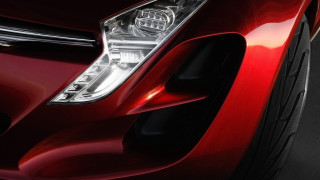 Red car headlight bumper light - a white spot free wallpaper