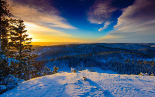 Sunset snowy mountain trees clouds 5 - a sunset over a snowy mountain free wallpaper