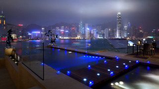 Large pool city skyline night - a city skyline free wallpaper