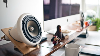 Desk computer speaker toy man - a desk free wallpaper for desktop