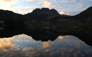 Mountain lake boat clouds sunset - archibald skirving free wallpaper
