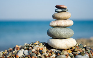 Stack of rocks beach ocean - a stack of rocks free wallpaper