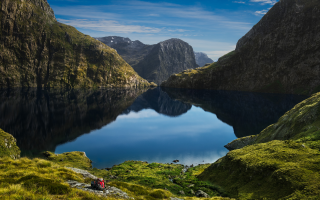 Mountain lake green grass person - a mountain lake free wallpaper