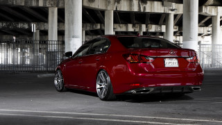 Red car parking lot building 7 - clean free wallpaper