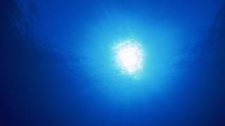 Bright sun ocean rayonism moonlight - a bright sun free wallpaper