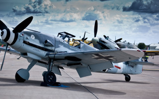Small airplane tarmac clouds military - dieselpunk free wallpaper