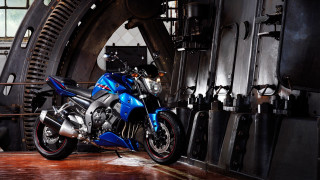 Blue motorcycle garage metal pipes - a blue motorcycle free wallpaper