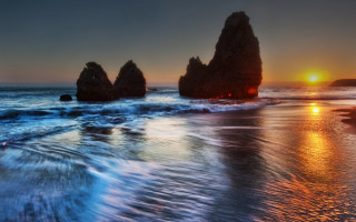 Sunset ocean rocks beach wave - a sunset over the ocean free wallpaper