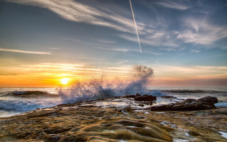 Wave rocky shore sunset ocean - a rocky shore free wallpaper