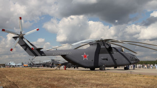 Military helicopter runway people cloudy - a cloudy sky in the background free wallpaper