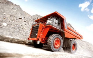 Orange truck dirt road mountain - a mountain side free wallpaper