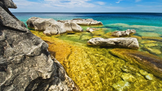 Rocky shore clear water green - the rock and the water free wallpaper
