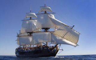 Sailboat ocean blue sky clouds 2 - detailed free wallpaper